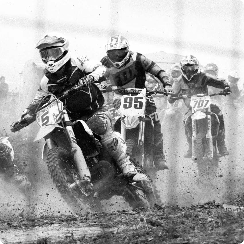 Multiple riders on a dirtbike.